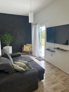 Casa em Florianópolis no bairro de Canasvieiras com sacada e churrasqueira!